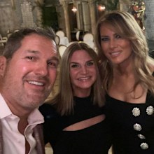 The couple posing with Melania Trump in Florida.