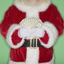 Santa holding money