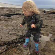 The little boy fell ill and had trouble walking before his diagnosis.