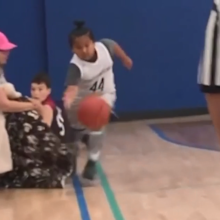 Mum tries to trip 9-year-old playing basketball against her son