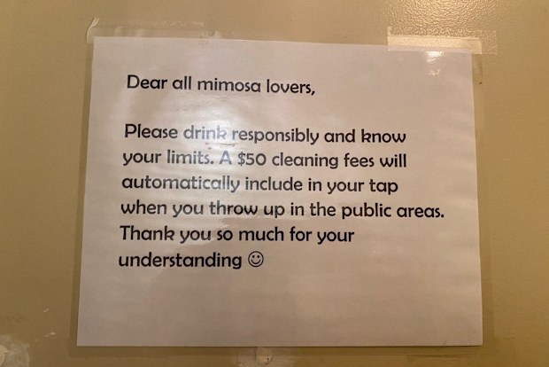Sign charging customers $50 vomit fee in Kitchen Story, San Francisco