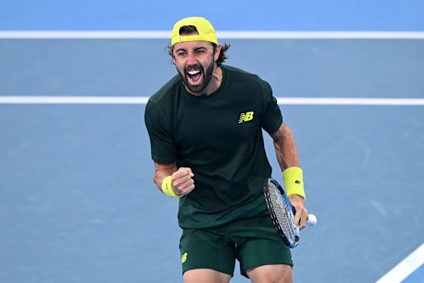 Jordan Thompson of Australia celebrates victory after his match against Matteo Berrettini of Italy.