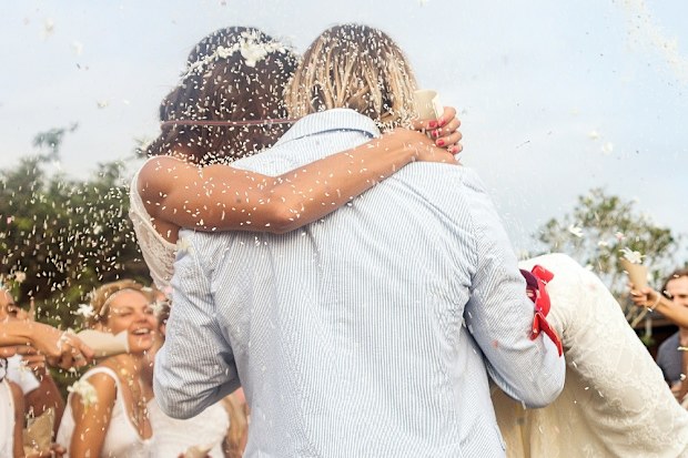 Wedding couple with children guests