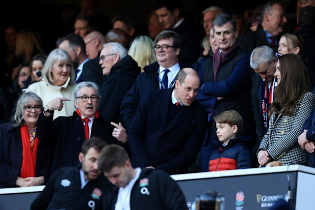 Prince William, Duke of Cambridge speaks to their son Prince George of Cambridge prior to the Guinness Six Nations Rugby match between England and Wales at Twickenham Stadium on February 26, 2022.