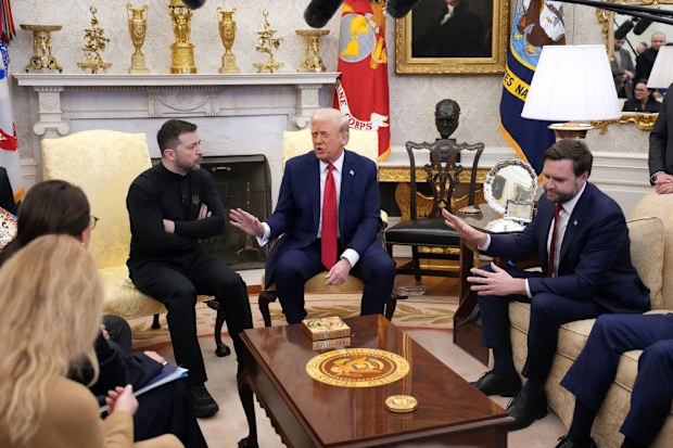 US President Donald Trump (C) and Vice President JD Vance meet with Ukrainian President Volodymyr Zelenskyy in the Oval Office.