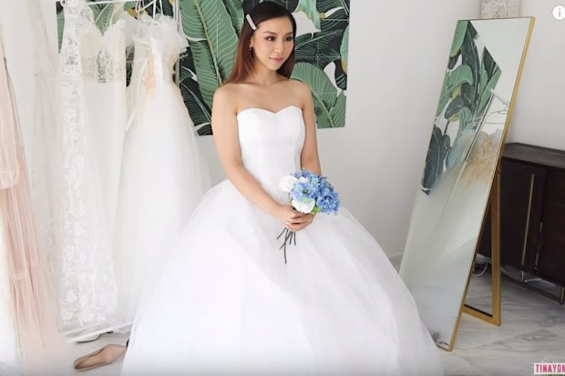 Australian influencer Tina Yong tries on budget wedding dresses from Wish
