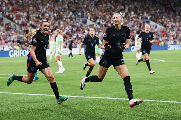 Chloe Kelly of England celebrates scoring her team's second goal.