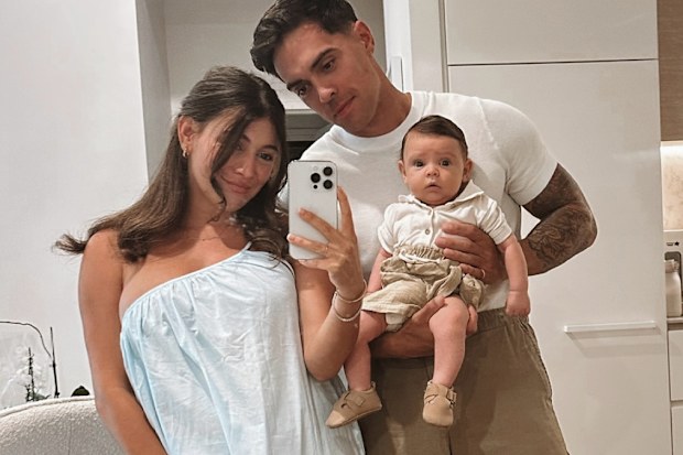 The wiggles' purple Wiggle john with wife Jessie and their son 
