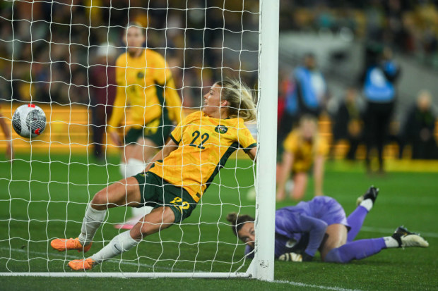 Charlotte Grant attempts to stop China PR first goal.