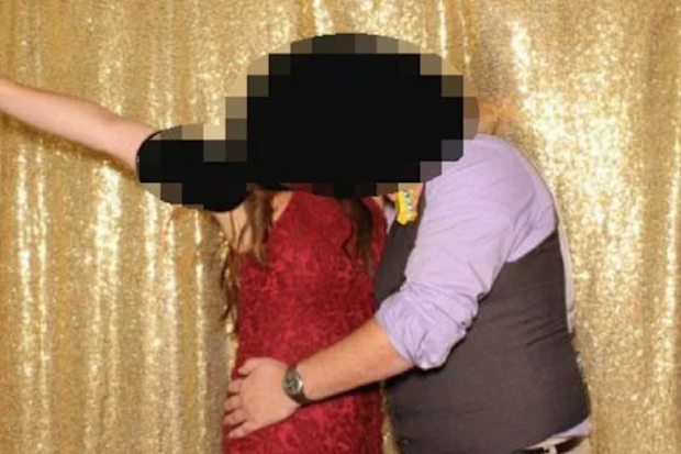 The couple were in hot water after the photo was shared by the wedding DJ.