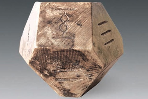 A 14-sided dice was found near a tomb in China. (Supplied)