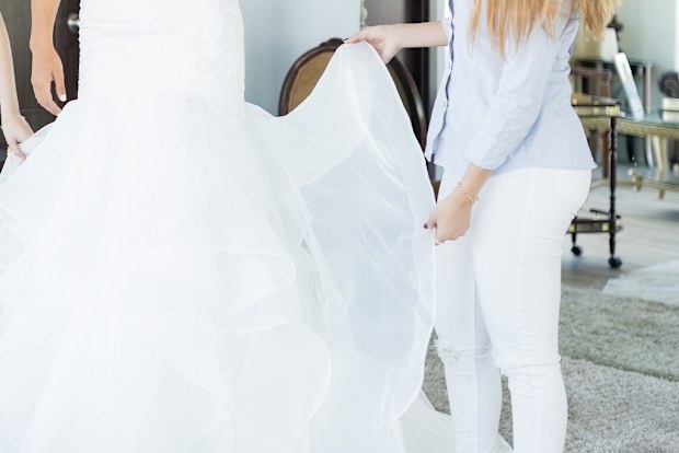 Trying on wedding dress