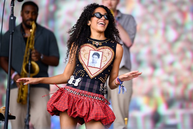 GLASTONBURY, ENGLAND - JUNE 28: Olivia Dean performs on the Pyramid Stage during day three of Glastonbury Festival 2024 at Worthy Farm, Pilton on June 28, 2024 in Glastonbury, England. Founded by Michael Eavis in 1970, Glastonbury Festival features around 3,000 performances across over 80 stages. Renowned for its vibrant atmosphere and iconic Pyramid Stage, the festival offers a diverse lineup of music and arts, embodying a spirit of community, creativity, and environmental consciousness. (Photo