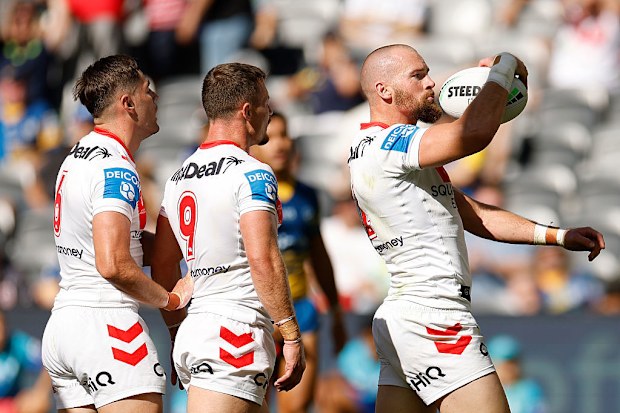 Clint Gutherson of the Dragons celebrates a try.