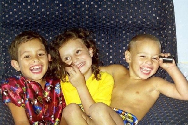 Karlie with brothers.