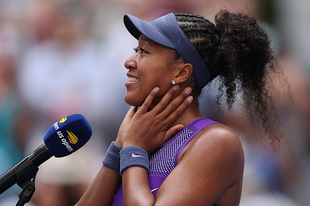Naomi Osaka of Japan is interviewed after defeating Coco Gauff of the United States.