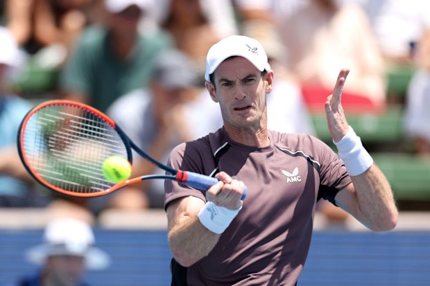 Andy Murray of Great Britain plays a forehand against Marin Cilic of Croatia.
