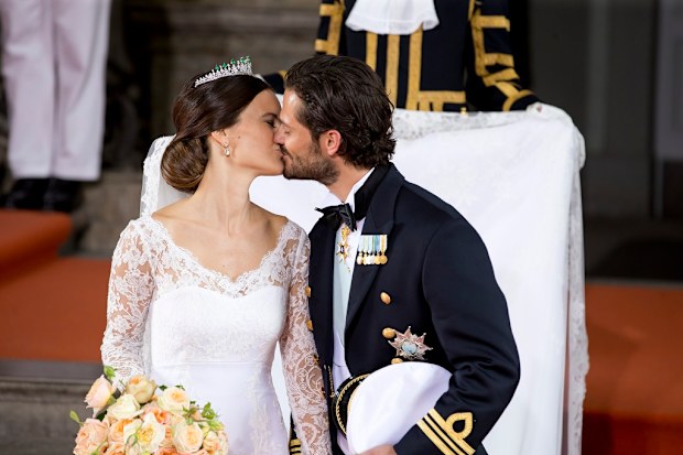 Prince Carl Philip and Princess Sofia leave their wedding ceremony at the Royal Chapel at the Royal Palace on June 13, 2015 in Stockholm, Sweden. 