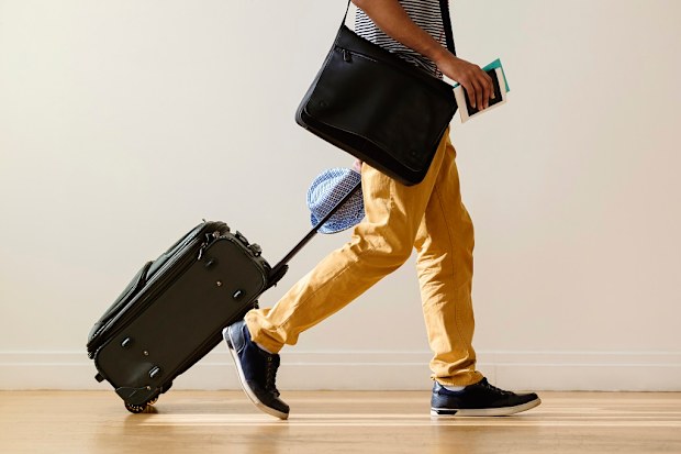 Man at airport travelling for work