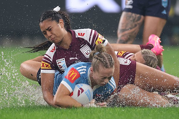 Abbi Church of the Blues is tackled.