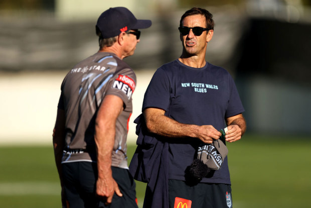 Greg Alexander and Andrew Johns speak during the New South Wales Blues State of Origin captain's run before Game II in 2023.