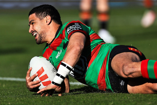 Cody Walker of the Rabbitohs scores a try against the Wests Tigers.