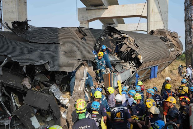 Crane falls into a passenger train in Thailand