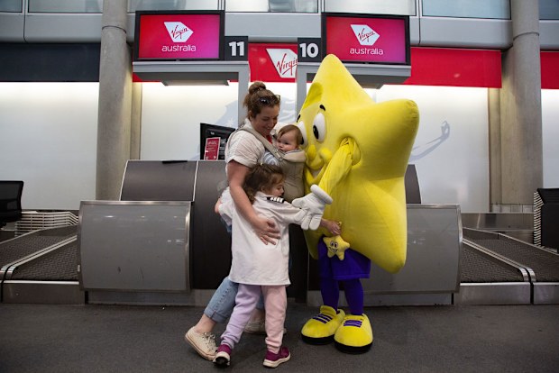 Izzy with her mum Amy and little brother William at the Starlight event.