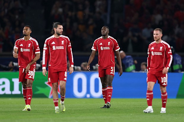Liverpool react after conceding a goal.