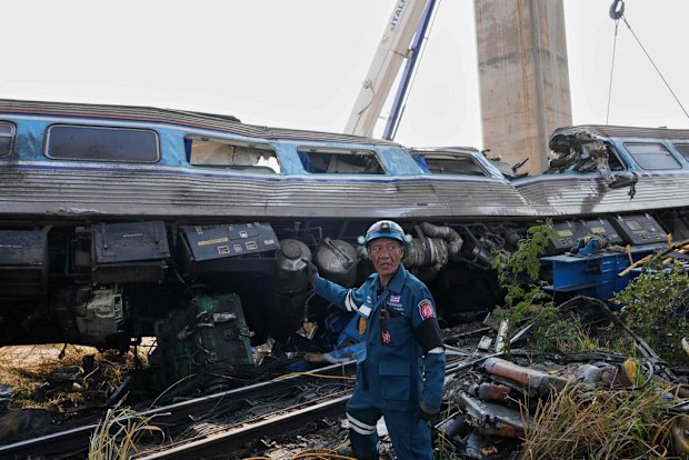 Crane falls into a passenger train in Thailand