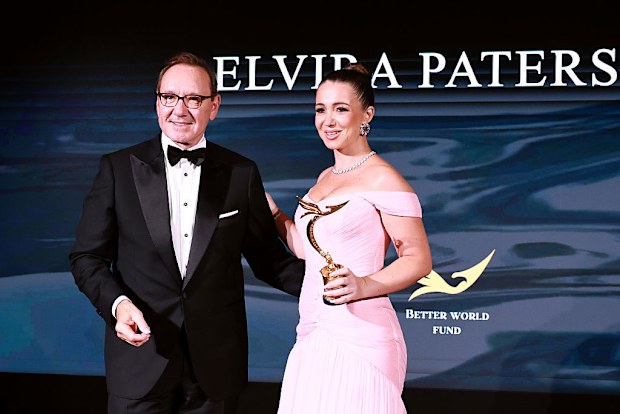 VENICE, ITALY - AUGUST 30: Kevin Spacey and Elvira Paterson on stage during The Better World Fund Gala Venice 2025 during the 82nd Venice International Film Festival on August 30, 2025 in Venice, Italy. (Photo by Theo Wargo/Getty Images)