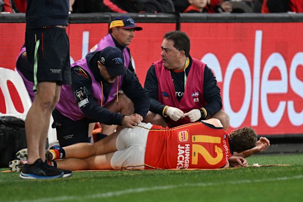 Jordan Dawson receives medical attention.