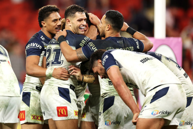 Cowboys celebrate their victory over the Rabbitohs.