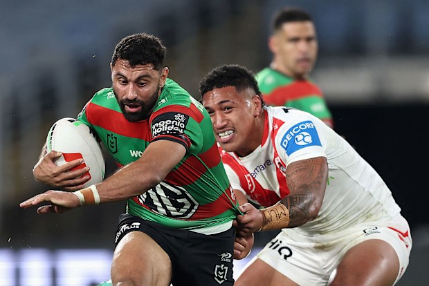 Alex Johnston of the Rabbitohs is tackled.