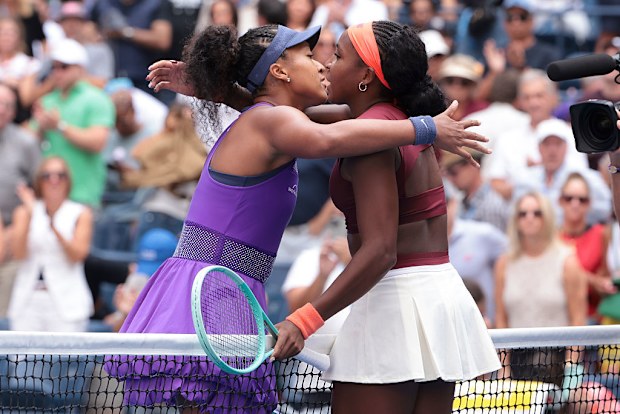 Naomi Osaka of Japan hugs Coco Gauff of USA.