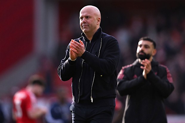 Arne Slot acknowledges the fans.