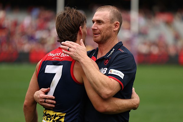 Melbourne Coach Simon Goodwin and Jack Viney of the Demons embrace.