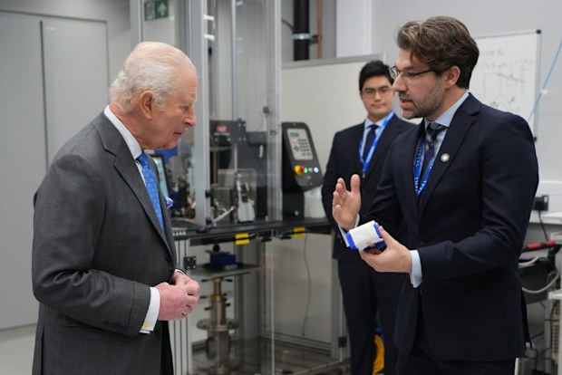King Charles III is shown around a laboratory by researcher Spyros Masouros 