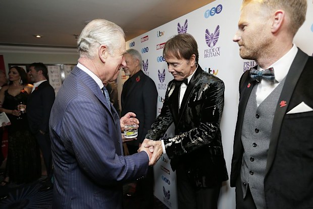 Prince Charles, Prince of Wales greets Cliff Richard at the Pride Of Britain awards at the Grosvenor House Hotel on October 31, 2016