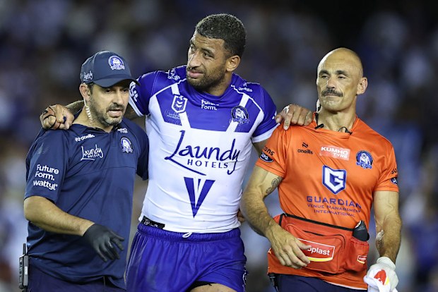 Viliame Kikau of the Bulldogs walks off after sustaining an injury.