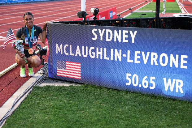2024 U.S. Olympic Team Track & Field Trials; Gold medalist Sydney McLaughlin-Levrone poses with her new world record in the women's 400 meter hurdles final.