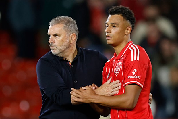 Ange Postecoglou and Dan Ndoye of Nottingham Forest look dejected.