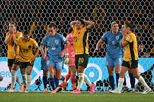Sam Kerr reacts after missing a shot at goal against England in the World Cup.
