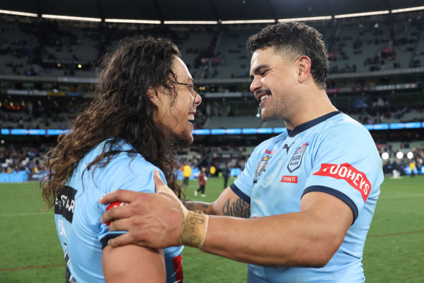 Latrell Mitchell embraces Jarome Luai as they celebrate NSW's victory.