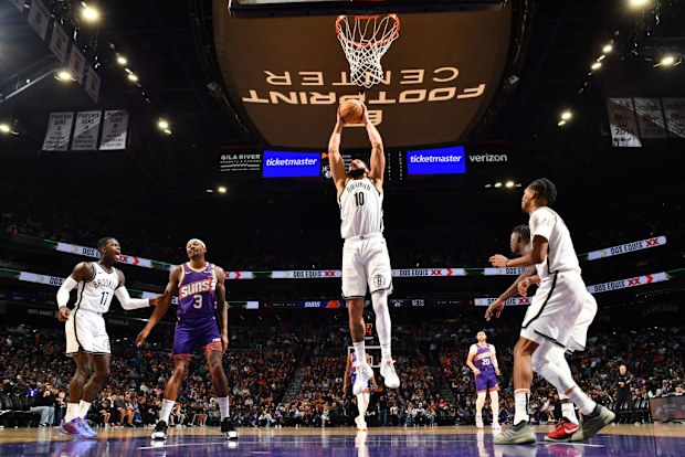 Ben Simmons #10 of the Brooklyn Nets goes up for the rebound.