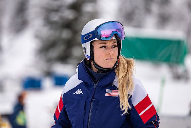 Lindsey Vonn looks on.