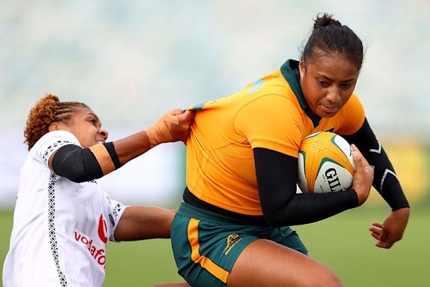 Faitala Moleka of the Wallaroos is tackled.