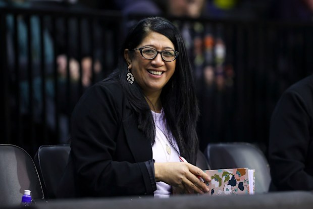 Former Silver Fern Gail Parata sits on the sidelines.