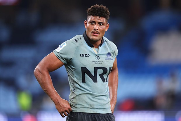 Miles Amatosero of the Waratahs looks dejected after defeat.