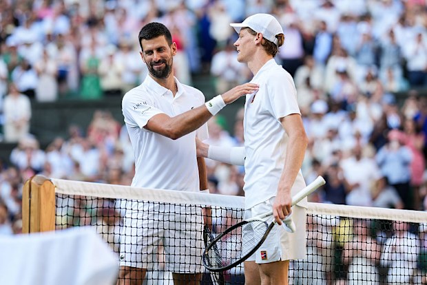 Novak Djokovic and Jannik Sinner shake hands.
